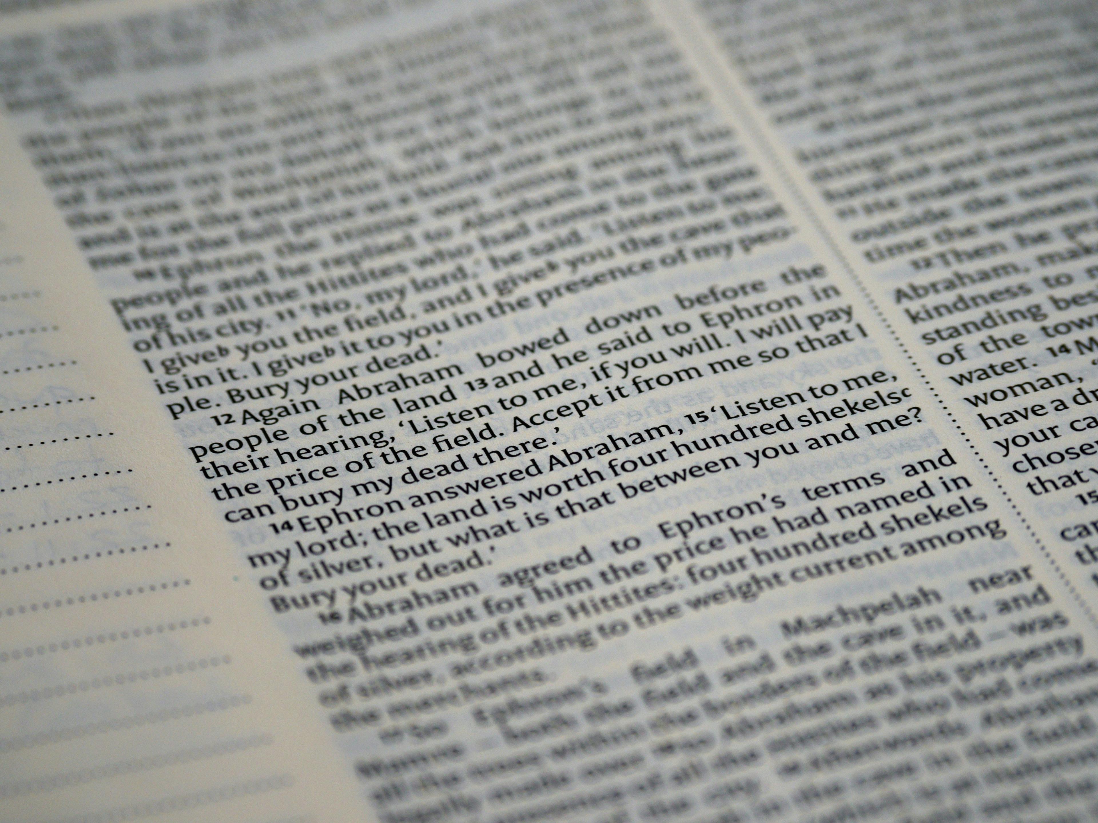 a close up of a book page with words on it