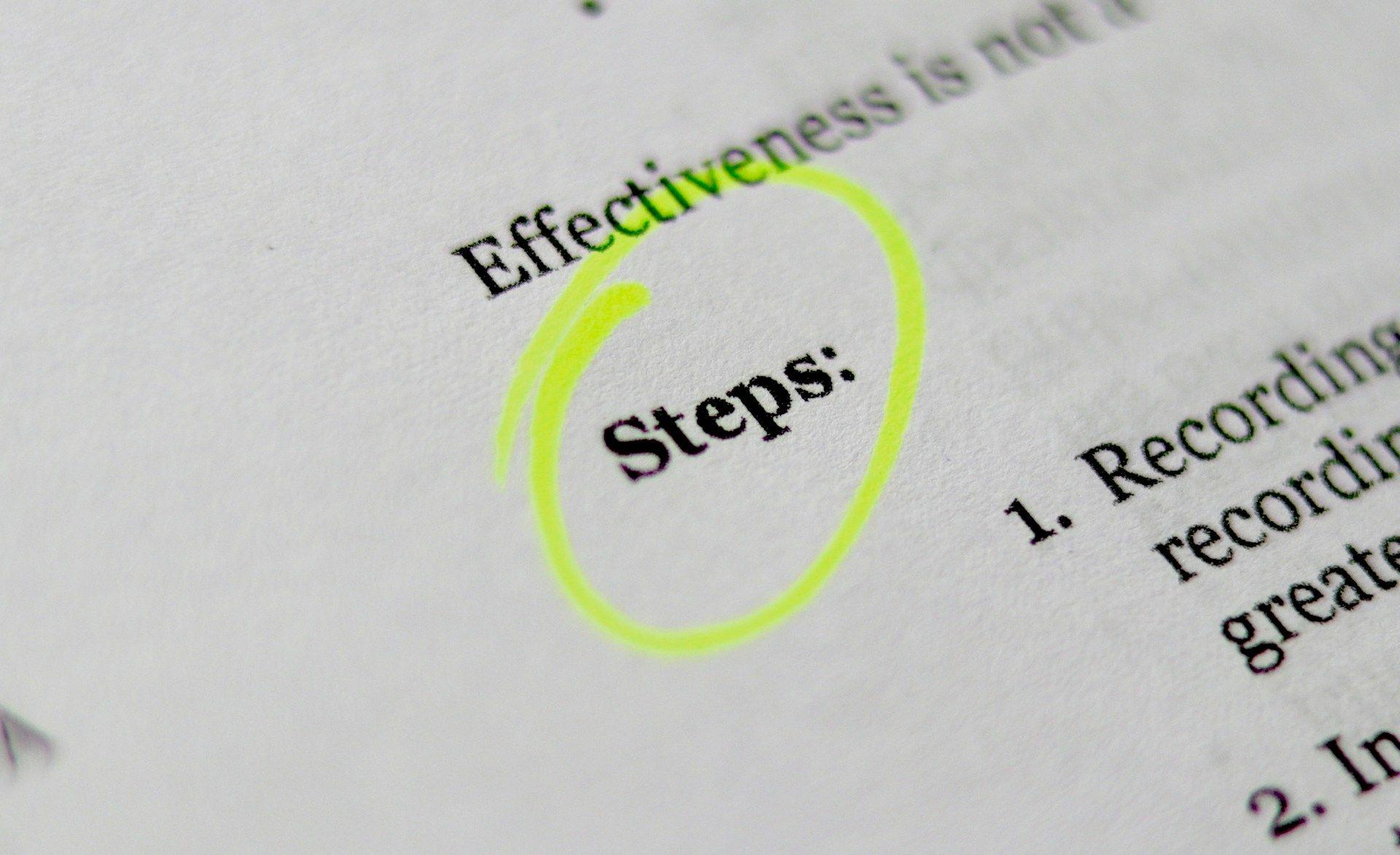 a close up of a document with the word effectiveness circled