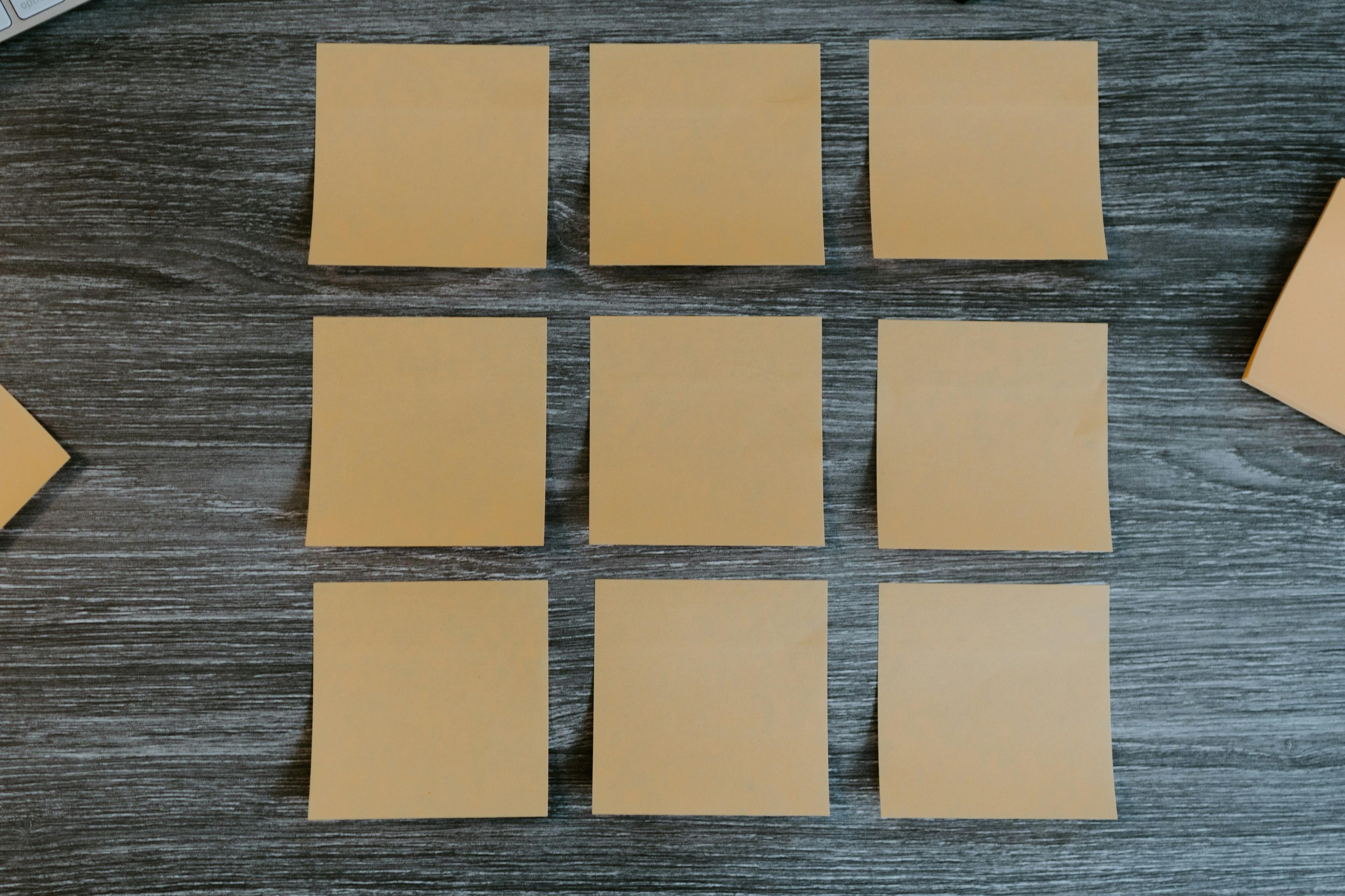 several pieces of paper are placed on a table